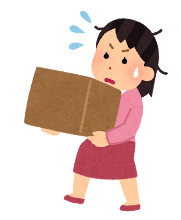 重い荷物を運ぶ人